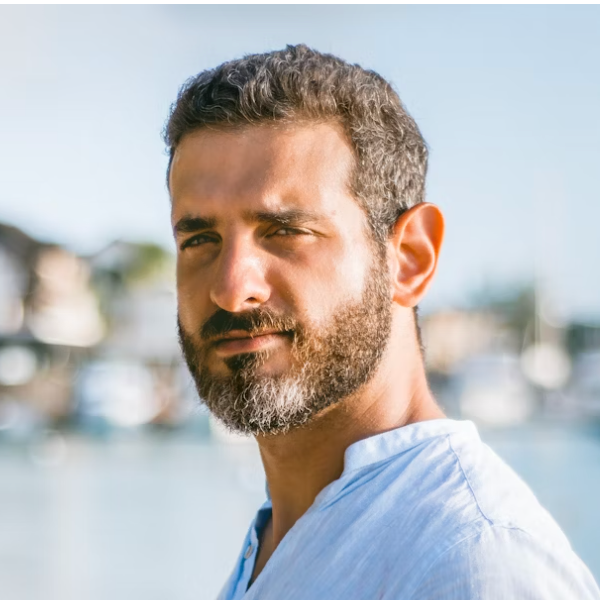 Bearded man outdoors smiling
